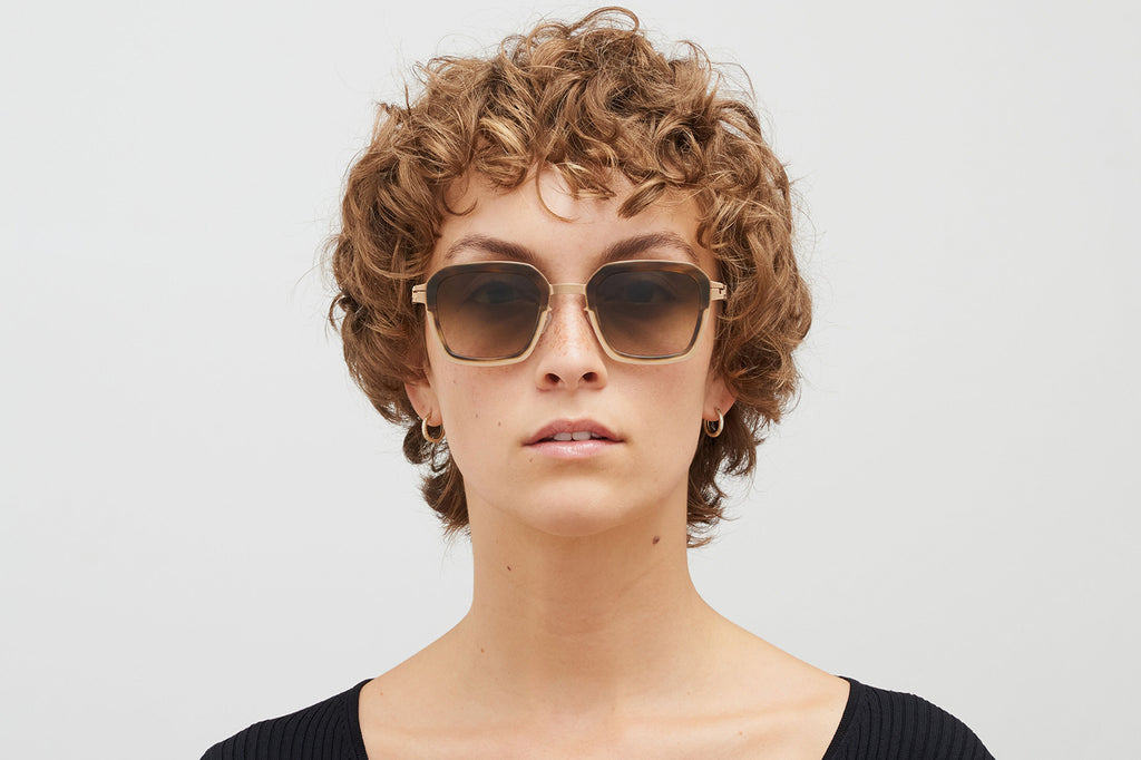 MYKITA® - Misty Sunglasses Champagne Gold/Galapagos with Raw Brown Gradient Lenses